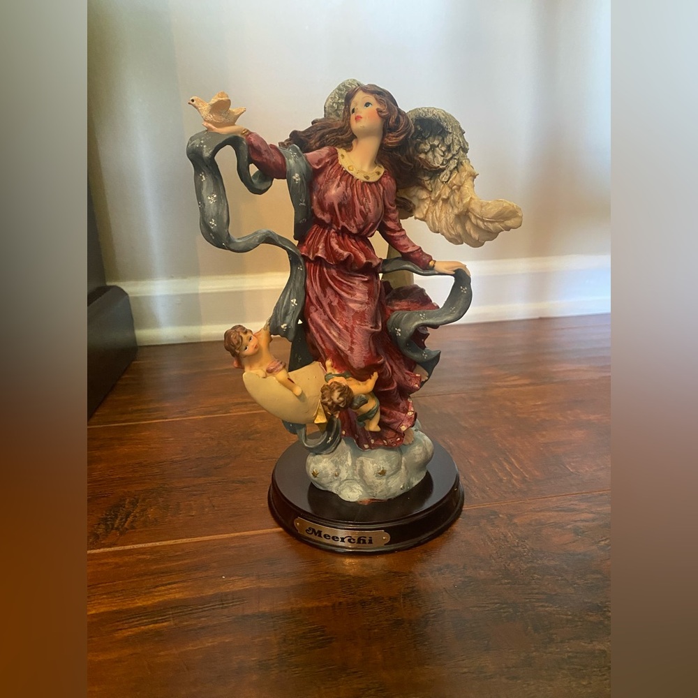 Dynamic Red and Gray Sculpture with Classical Elegance